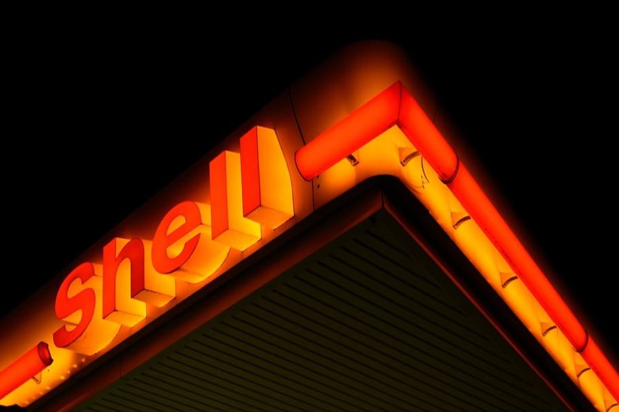 low-angle-photography-of-shell-gas-station-at-night.jpg