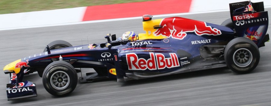 1200px-Sebastian_Vettel_2011_Malaysia_FP1_1.jpg