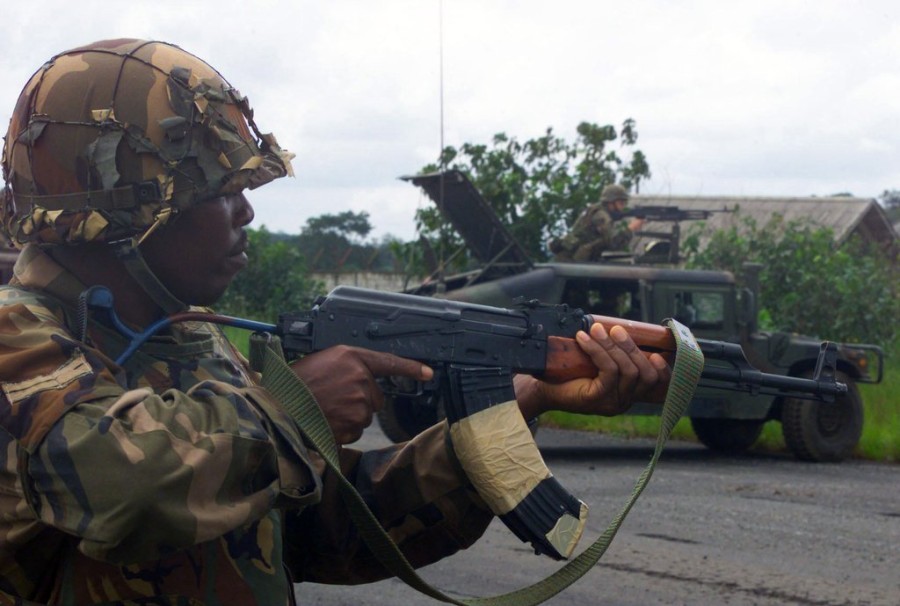 a-nigerian-army-soldier-armed-with-a-545mm-ak-74-assault-rifle-provides-security-962223.jpg