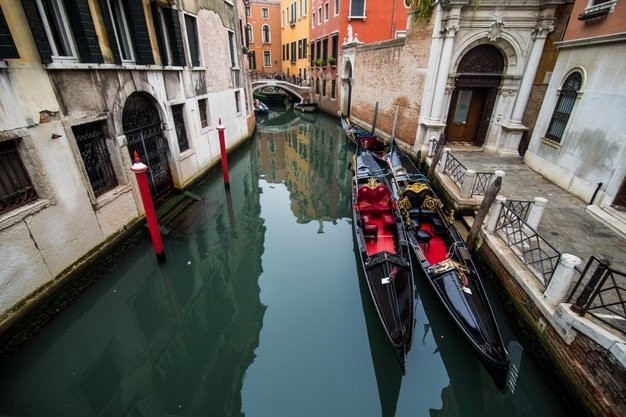 traditional-canal-street-with-gondola-venice-city-italy_231208-7690.jpg