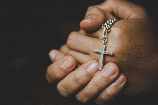 spirituality-religion-women-religious-concepts-hands-praying-god-while-holding-cross-symbol-nun-caught-cross-his-hand_1150-14899.jpg