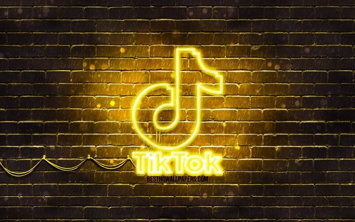 thumb2-tiktok-yellow-logo-4k-yellow-brickwall-tiktok-logo-social-networks.jpg